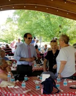 Greeting attendees at the Council on Aging Fathers Day BBQ