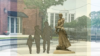 bronze sculpture of Charlotte Forten standing tall