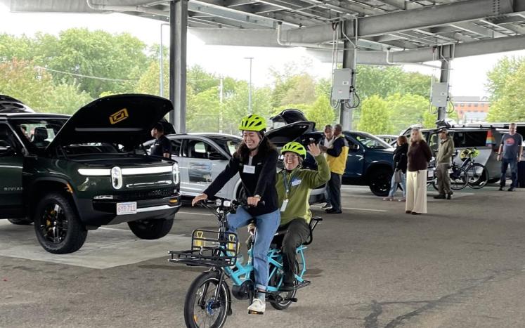 2 riders on an e-cargo bike